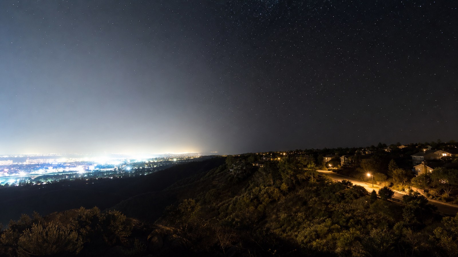 Night-sky scene illustrating a causal map separating skyglow, glare, trespass, clutter, ecological effects, and scalable interventions