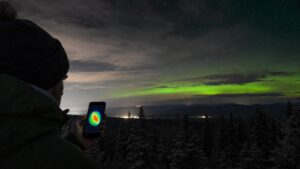 Night-sky scene illustrating a forecast-reading workflow from solar observations to local cloud and horizon checks, with clear limits on lead time