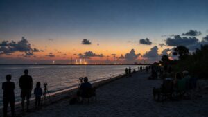 Florida shoreline spectators waiting for a distant Artemis launch